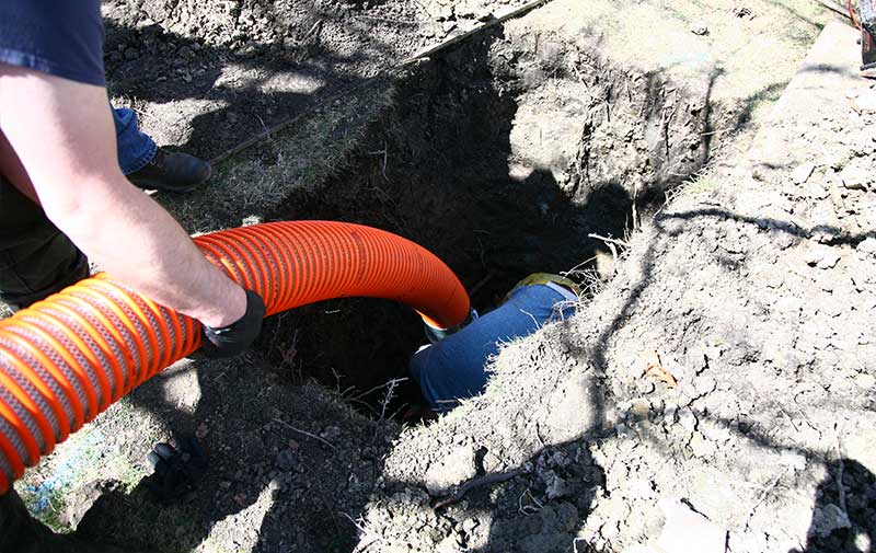 flowing new sewer liner through existing sewer pipe